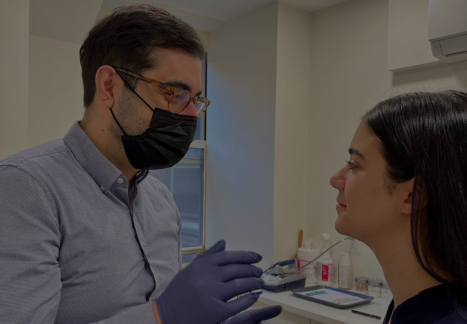 Dr. Nojan treating a patient in his Midtown Manhattan office